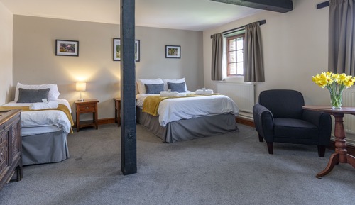 Doppel- oder Zweibettzimmer