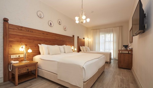 Deluxe-Dreibettzimmer, Gartenblick
