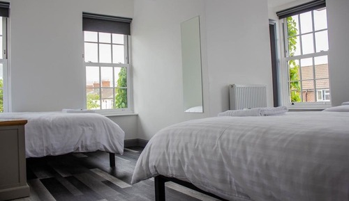 Doppel- oder Zweibettzimmer