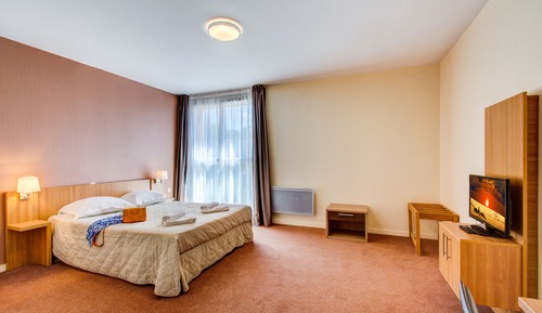 Doppel- oder Zweibettzimmer
