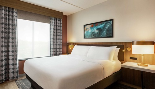 Jr Ste, Evolution, Zi. mit 1 King-B.