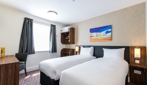 Doppel- oder Zweibettzimmer