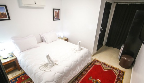 Doppel- oder Zweibettzimmer