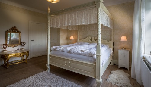 Romantische Suite, 1 King-Bett, Badewanne, eingeschränkter Meerblick