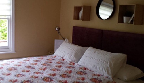 Deluxe-Doppel- oder -Zweibettzimmer, mit Bad, Gartenblick