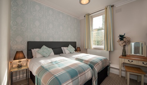 Doppel- oder Zweibettzimmer