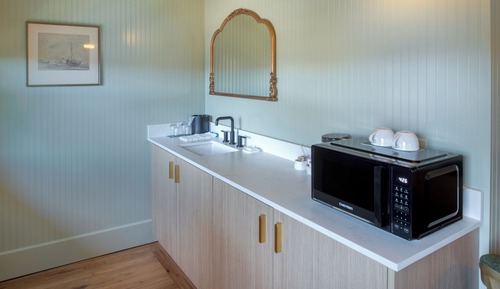 Deluxe-Suite, 1 King-Bett, Kamin, eingeschränkter Meerblick