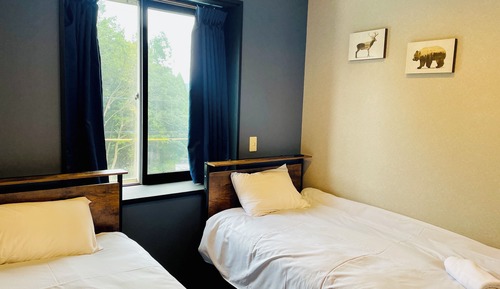 Doppel- oder Zweibettzimmer, 2 Einzelbetten