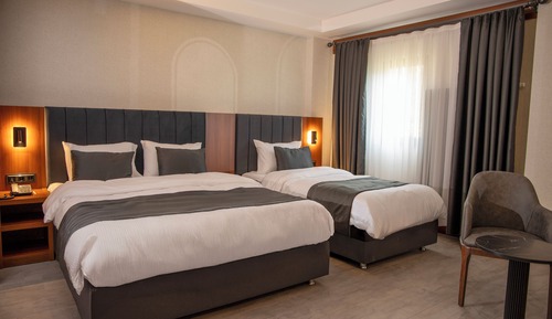 Deluxe-Dreibettzimmer