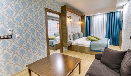 Familien-Doppel- oder -Zweibettzimmer