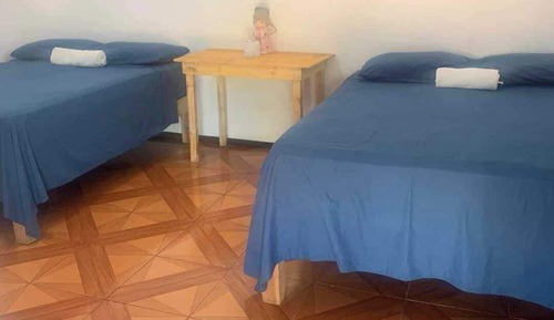 Habitación económica, 2 camas de matrimonio, vistas a la playa
