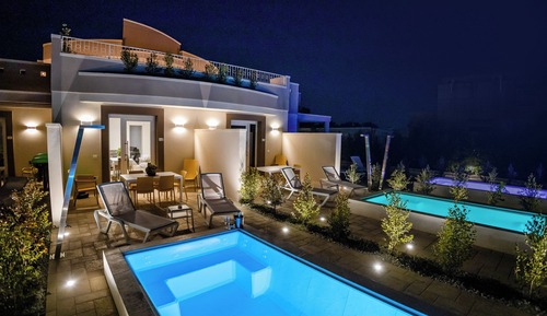 Luxury-Suite, Terrasse, Poolblick