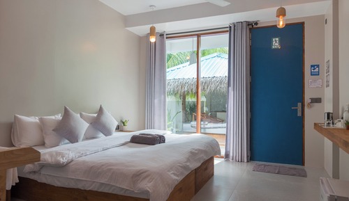 Deluxe-Dreibettzimmer, Gartenblick