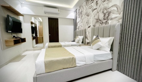 Deluxe-Doppel- oder -Zweibettzimmer