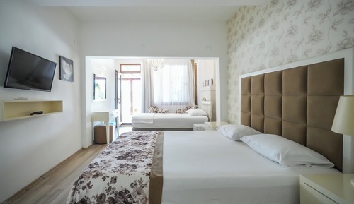 Dreibettzimmer, Meerblick