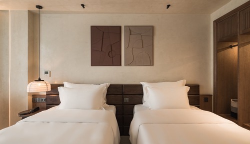 Doppel- oder Zweibettzimmer