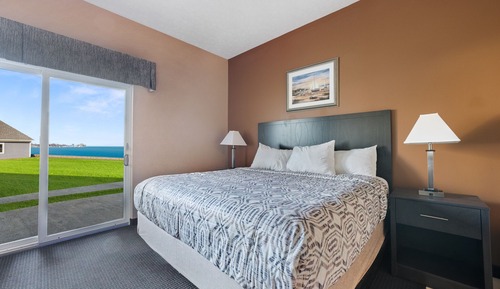 Zimmer, 1 King-Bett, Whirlpool, Seeblick