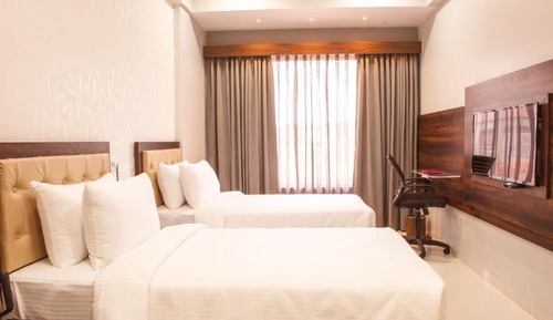 Deluxe-Doppel- oder -Zweibettzimmer