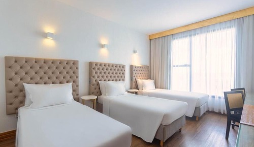 Deluxe-Dreibettzimmer