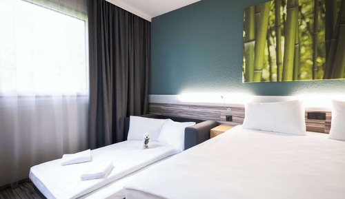 Familienzimmer, 1 King-Bett und Schlafsofa