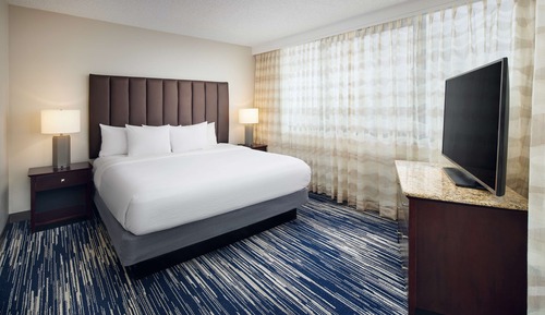 Suite, 1 King-Bett, Balkon, Eckzimmer