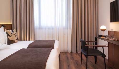 Superior-Doppel- oder -Zweibettzimmer