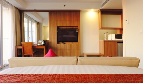 Junior Suite Balcony with Pool View