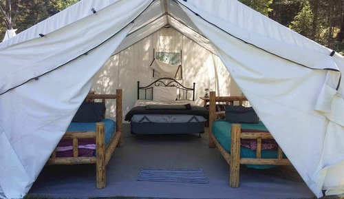 John Dunbar's Wall Tent (no electricity/shared bath house)