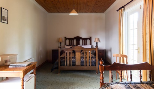 Familienzimmer, 1 Schlafzimmer, Balkon, zum Garten hin (Myra's Unit)