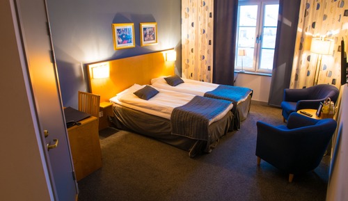 Doppel- oder Zweibettzimmer
