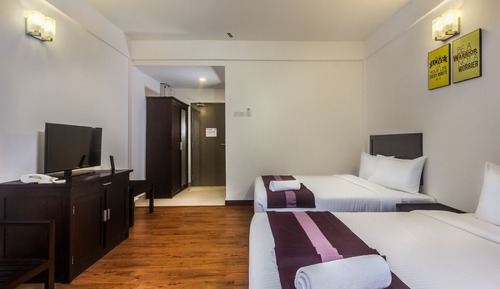 Deluxe-Vierbettzimmer, Gartenblick