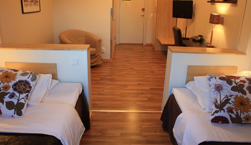 Doppel- oder Zweibettzimmer