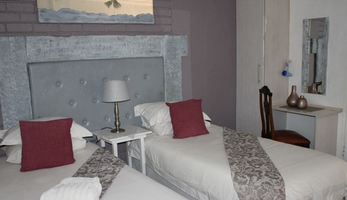 Doppel- oder Zweibettzimmer