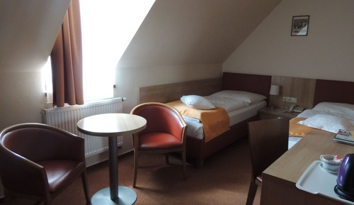 Doppel- oder Zweibettzimmer