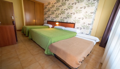 Dreibettzimmer, Gartenblick