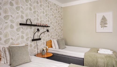 Doppel- oder Zweibettzimmer