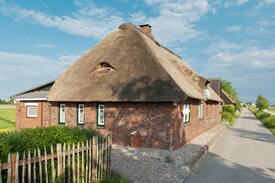 Suederhafen Haus | Reetdachhaus Moordeichperle auf Nordstrand