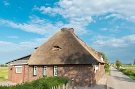 Suederhafen Haus | Reetdachhaus Moordeichperle auf Nordstrand