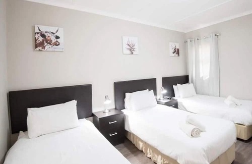 Windhoek Haus | Perfect for Groups! 2 Spacious Chalets with Kitchenette & Private BBQ Area!