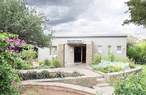 Windhoek Haus | Minutes Away from Haven Zoological Park! 2 Relaxing Chalets w/ Patio, Pool!