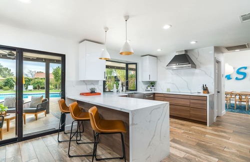 Continental Foothills Haus | Designer dream home with opulent backyard, private pool, hot tub, game room & AC