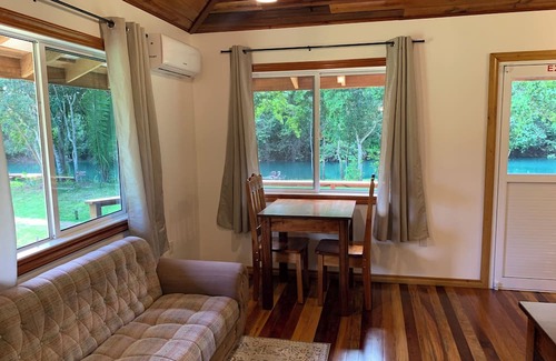 Orange Walk District Kabine | A Cozy cabin along the Rio Bravo River—bird watcher’s paradise with WiFi and AC.