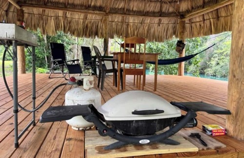Orange Walk District Kabine | A Cozy cabin along the Rio Bravo River—bird watcher’s paradise with WiFi and AC.