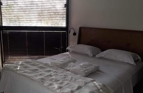 Sao Sebastiao das Aguas Claras Hotel | Pousada Canto da Lua - Macacos