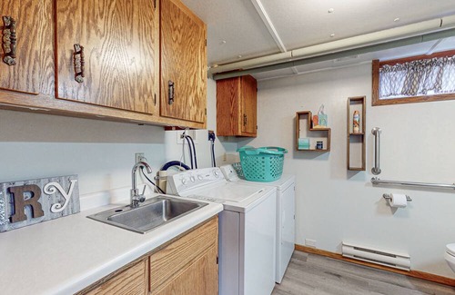 Hazelhurst Haus | Lakefront home with large patio, fire pit, air hockey & a provided peddle boat