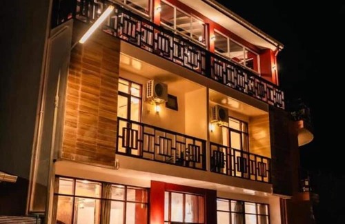 Huraa Haus | Charming Deluxe room in Huraa Guesthouse with AC, Wifi