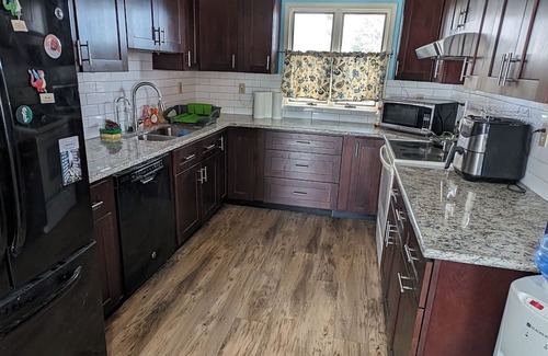 Levittown Haus | The Hexagon house in the Philadelphia suburbs. Sleeps 9, covered outdoor patio.