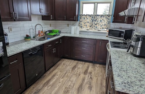 Levittown Haus | The Hexagon house in the Philadelphia suburbs. Sleeps 9, covered outdoor patio.