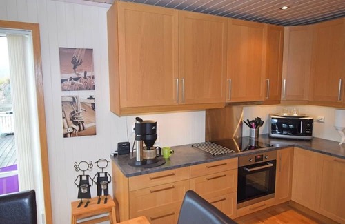 Farsund Haus | Holiday home "Lyngsvag" on Lyngsvagfjorden near Farsund -Spind, southern Norway, in an exceptionally beautiful location, Internet WLAN, 120 m² living space, sunny and sheltered holiday spot on the Farsund archipelago, chic furnishings, 3 bedrooms.