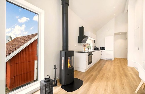 Vestbygd Haus | Holiday home 'Lista Maritim 5', built 2021, at the guest harbor in Borhaug-Borshavn near Farsund, Listafjorden, southern Norway, 7+2 persons, 135 m² living space, panoramic windows and south-facing balcony. south-facing balcony, modern furnishing.